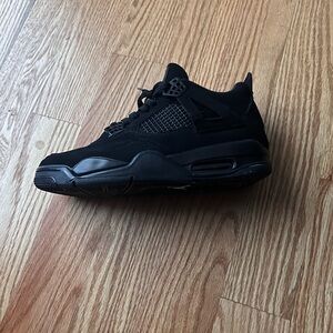 All black Jordan 4s